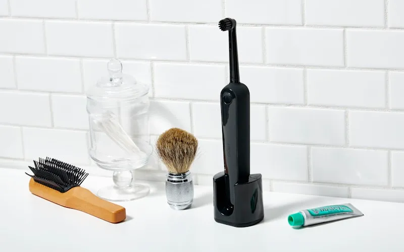 Close-up of an electric toothbrush head used for effective plaque removal