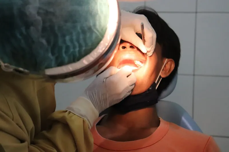 Patient recovering comfortably at home after dental implant surgery