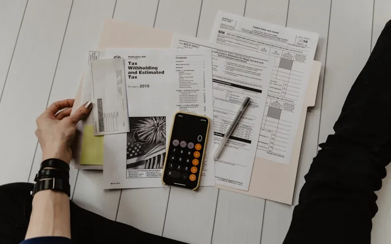 Insurance card and dental benefit documents laid out for review
