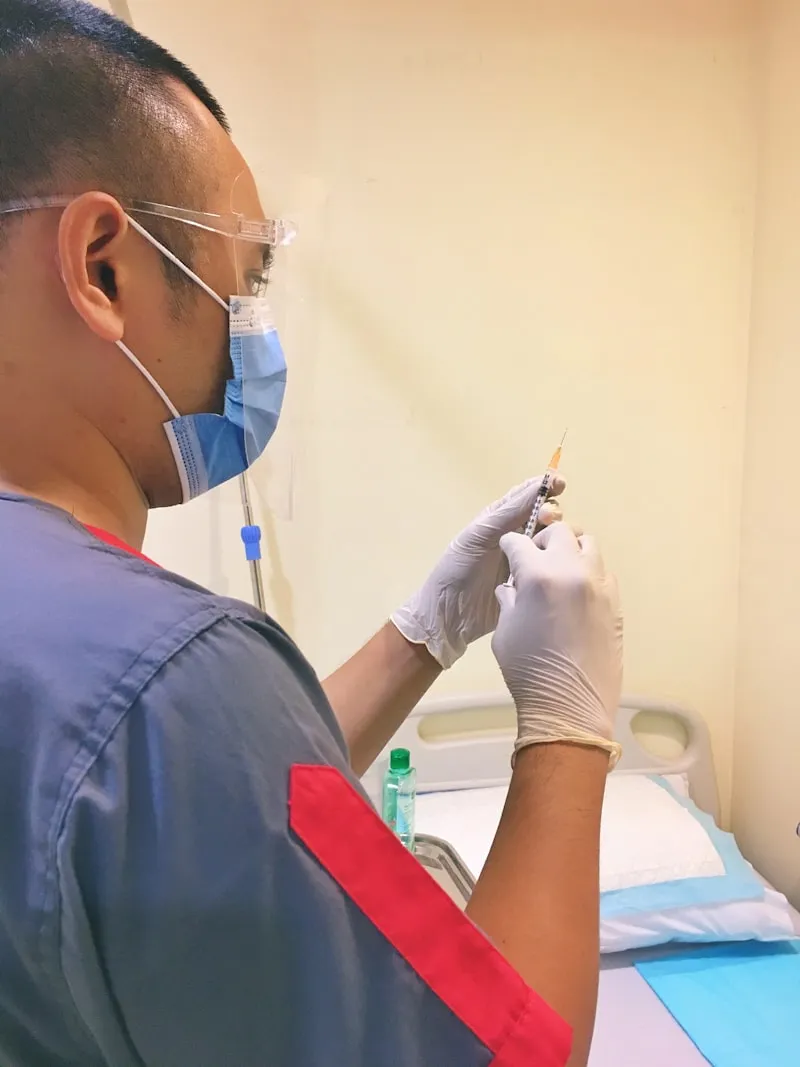 Smiling patient relaxing comfortably after a successful root canal treatment