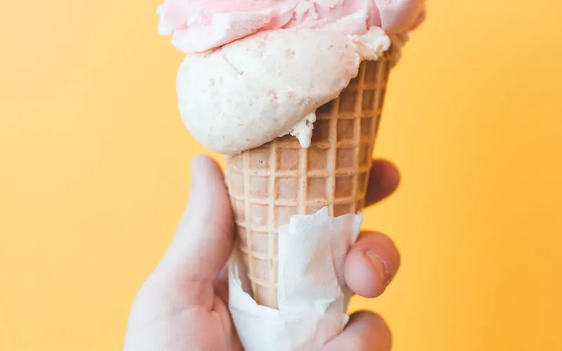 Ice cream cone representing cold foods that trigger tooth sensitivity
