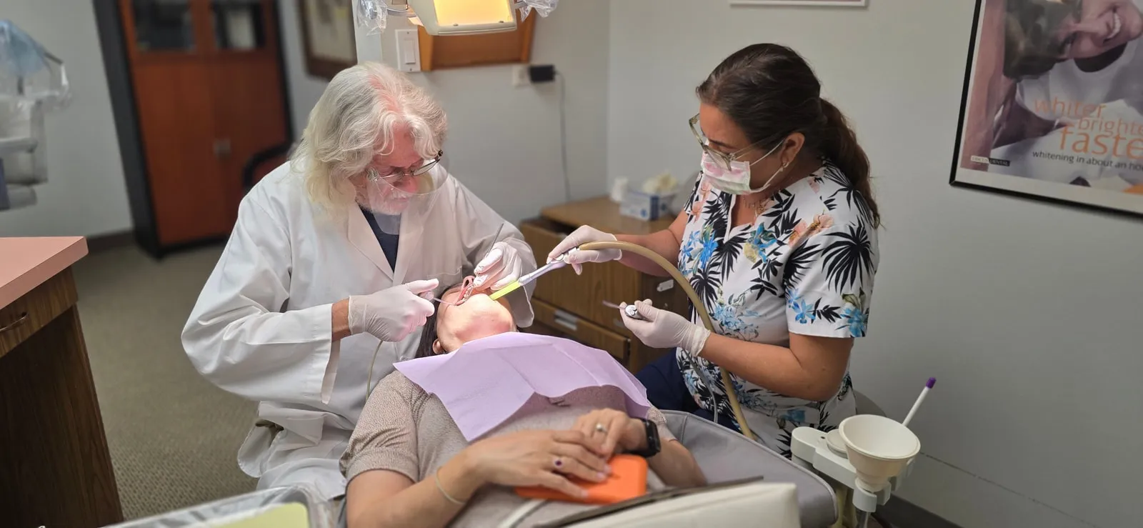 Dr. Baldwin and the HB Dentist team caring for a patient