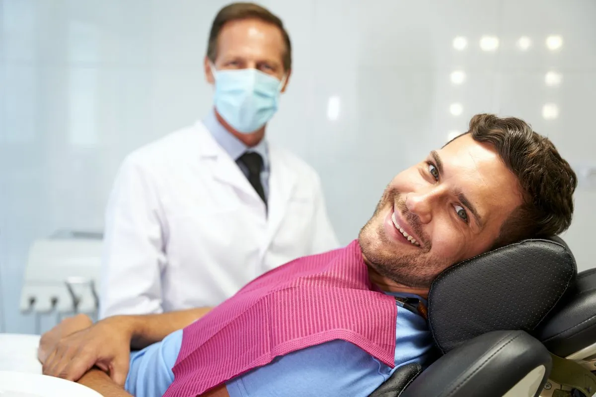 Dental professional performing precise root canal treatment using modern equipment