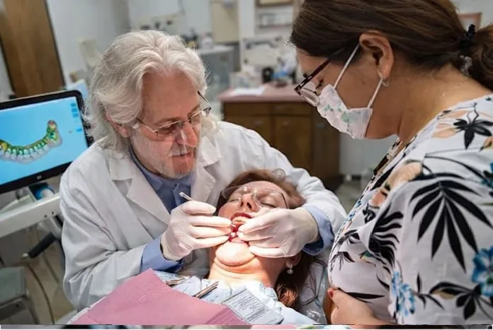 Dr. Baldwin using advanced 3D dental scanning technology