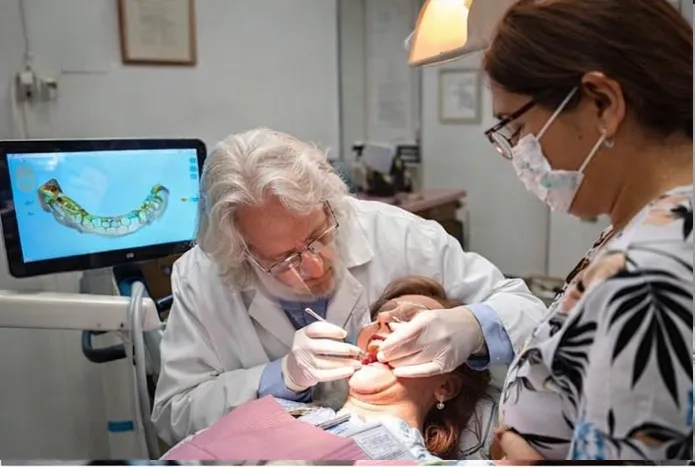 Team using 3D imaging technology during treatment